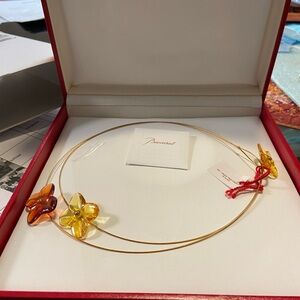 baccarat necklace with orange crystal butterflies. never worn in original box